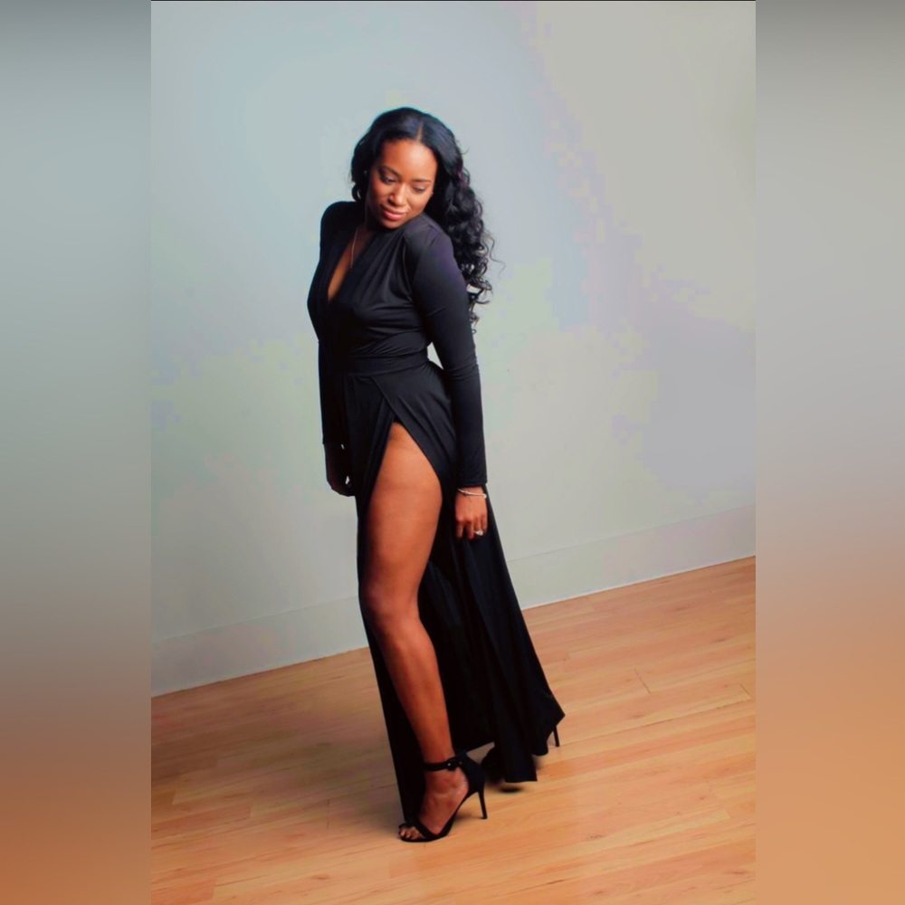 Beautiful long sleeve dress with high cuts on the right and left sides.